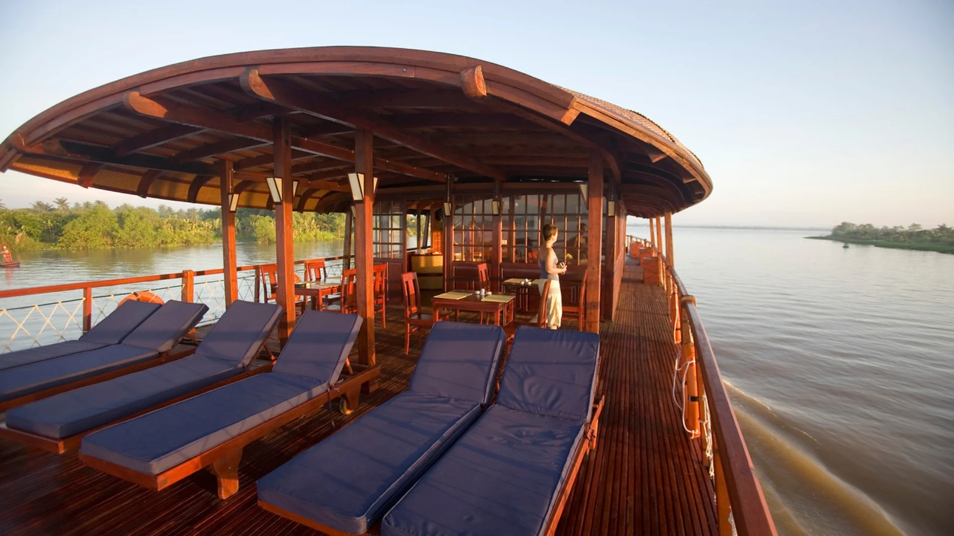 Relax on the sundeck and enjoy the tranquil Mekong scenery