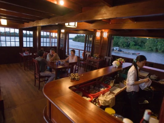 Mekong Smile Bassac Cruise Can Tho Cai Be Bassac Cruise restaurant interior with guests dining