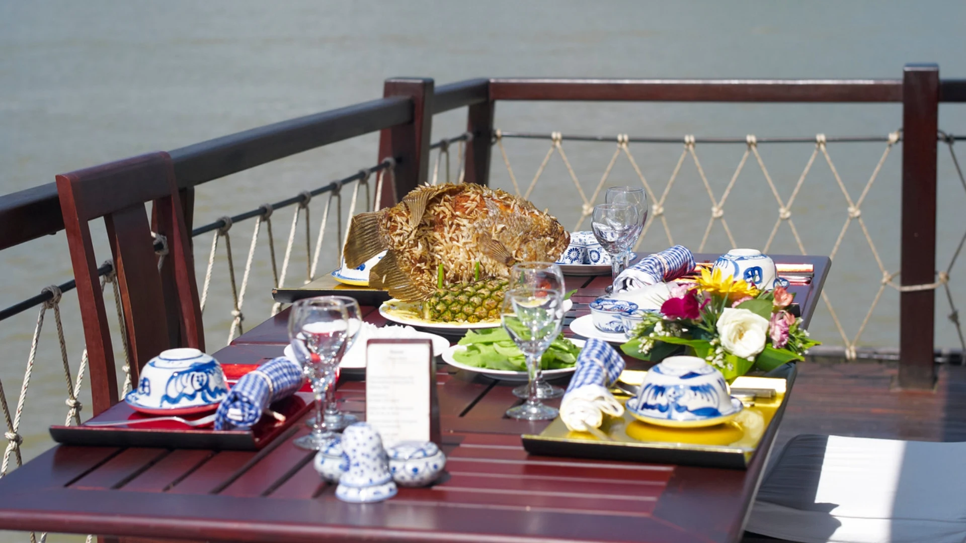 Mekong Smile Bassac Cruise Can Tho dining on deck with Mekong River view on Bassac Cruise