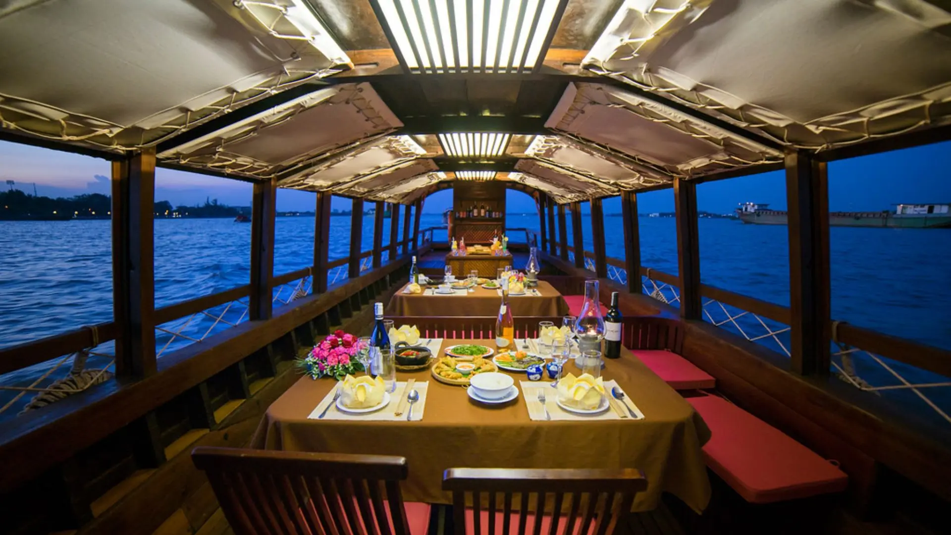 Luxury dinner soiree on Bassac Cruise during sunset in Can Tho
