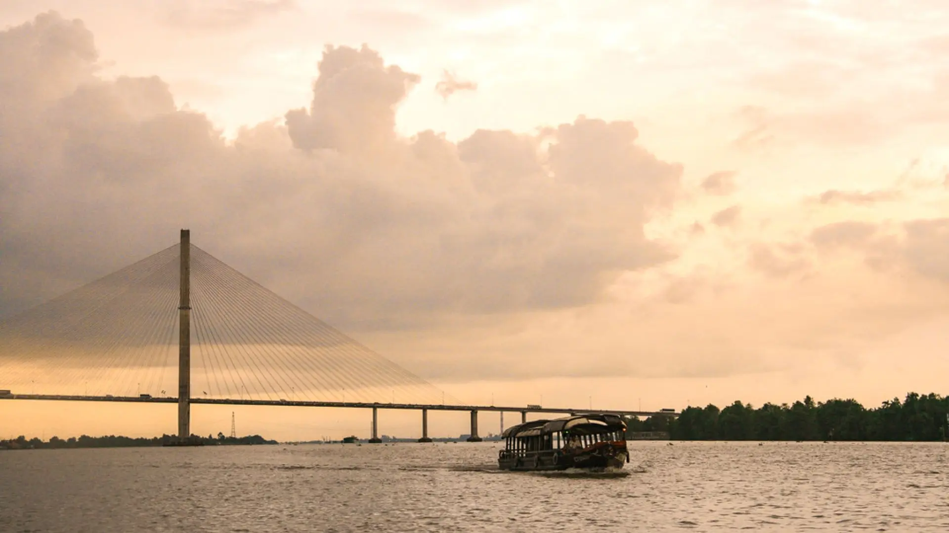 Sunset on the Hau River viewed from Bassac Cruise in Can Tho, Mekong Delta