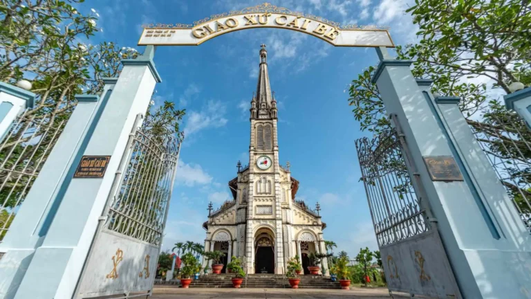Front gate view of Cai Be Church in Cai Be, Tien Giang, Vietnam with main facade