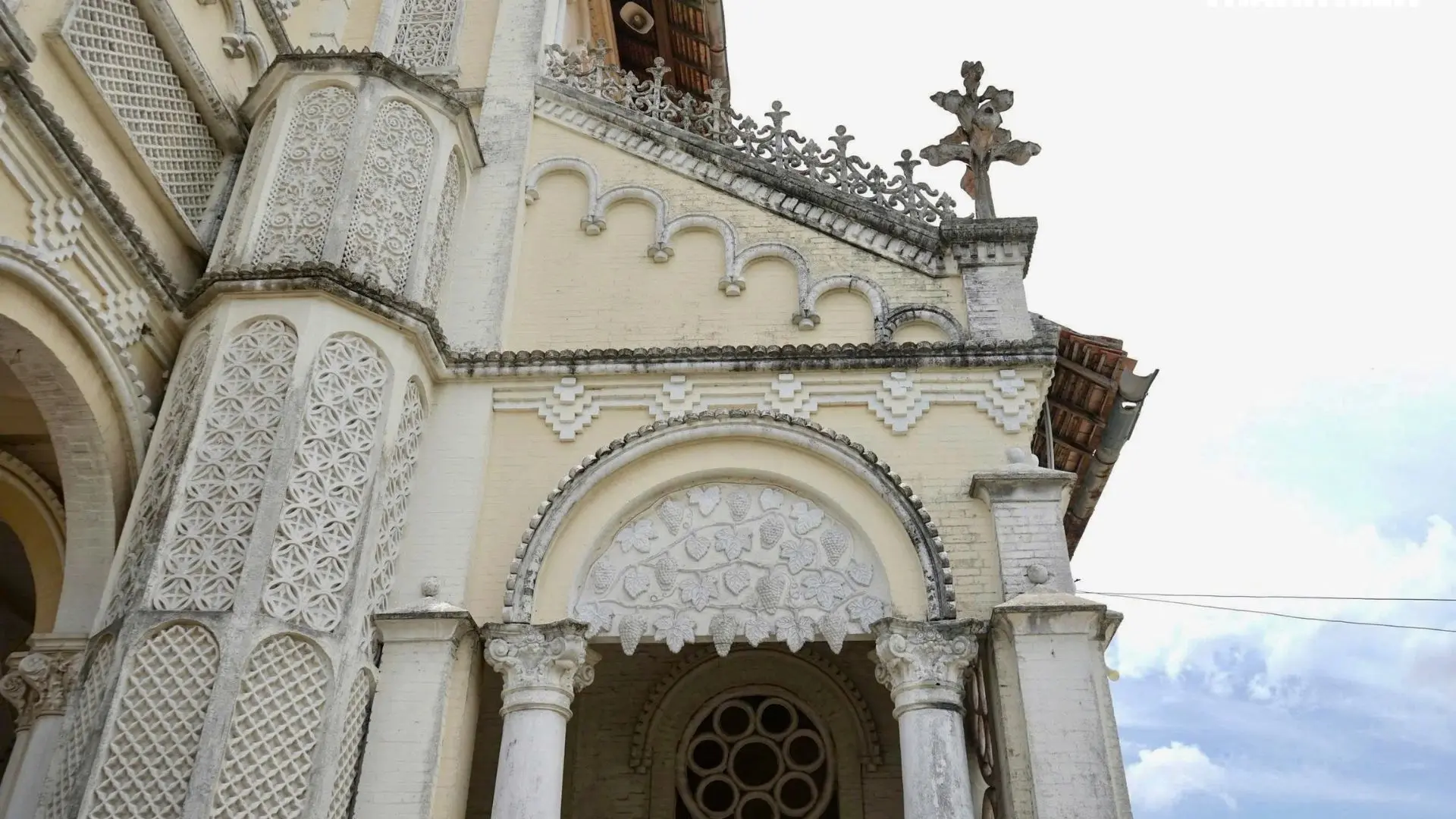 Close-up of Cai Be Church facade with Gothic architectural details in Cai Be, Tien Giang, Vietnam