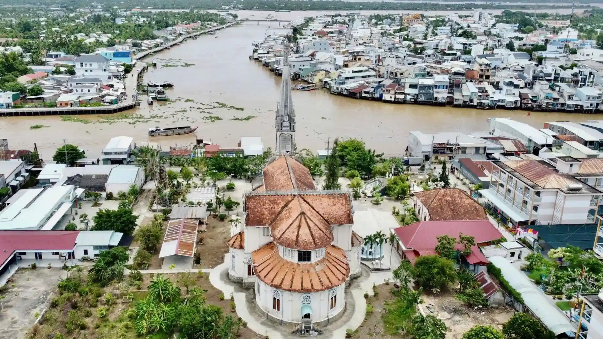 Top view of Cai Be Church and Mekong River layout in Cai Be, Tien Giang, Vietnam