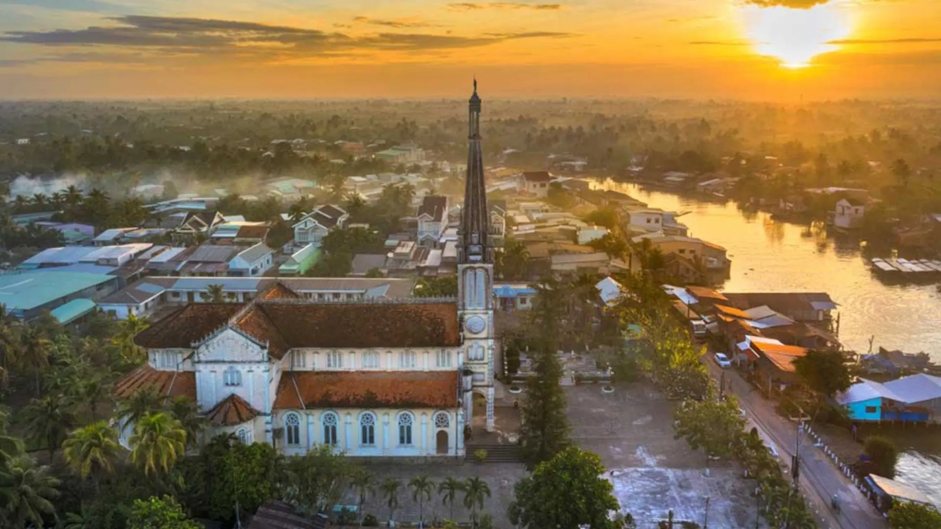 Sunset view of Cai Be Church in Cai Be, Tien Giang, Vietnam with Mekong Delta landscape