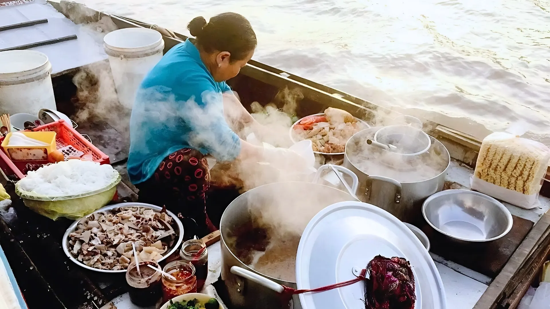 Mekong Smile Cai Be Floating Market breakfast served on boat with local food vendors on the river