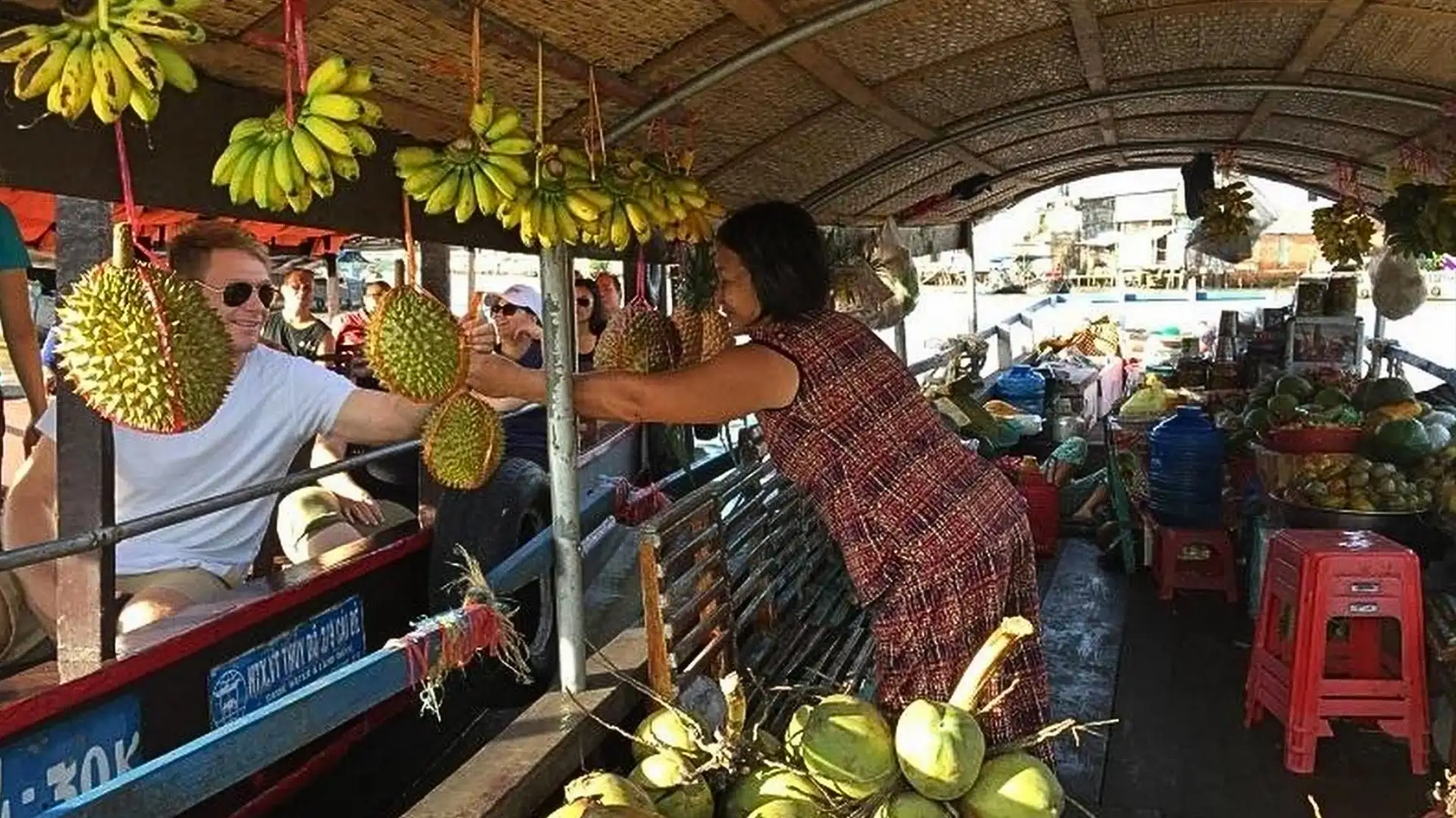 Mekong Smile Cai Be Floating Market busy trading activities on the river