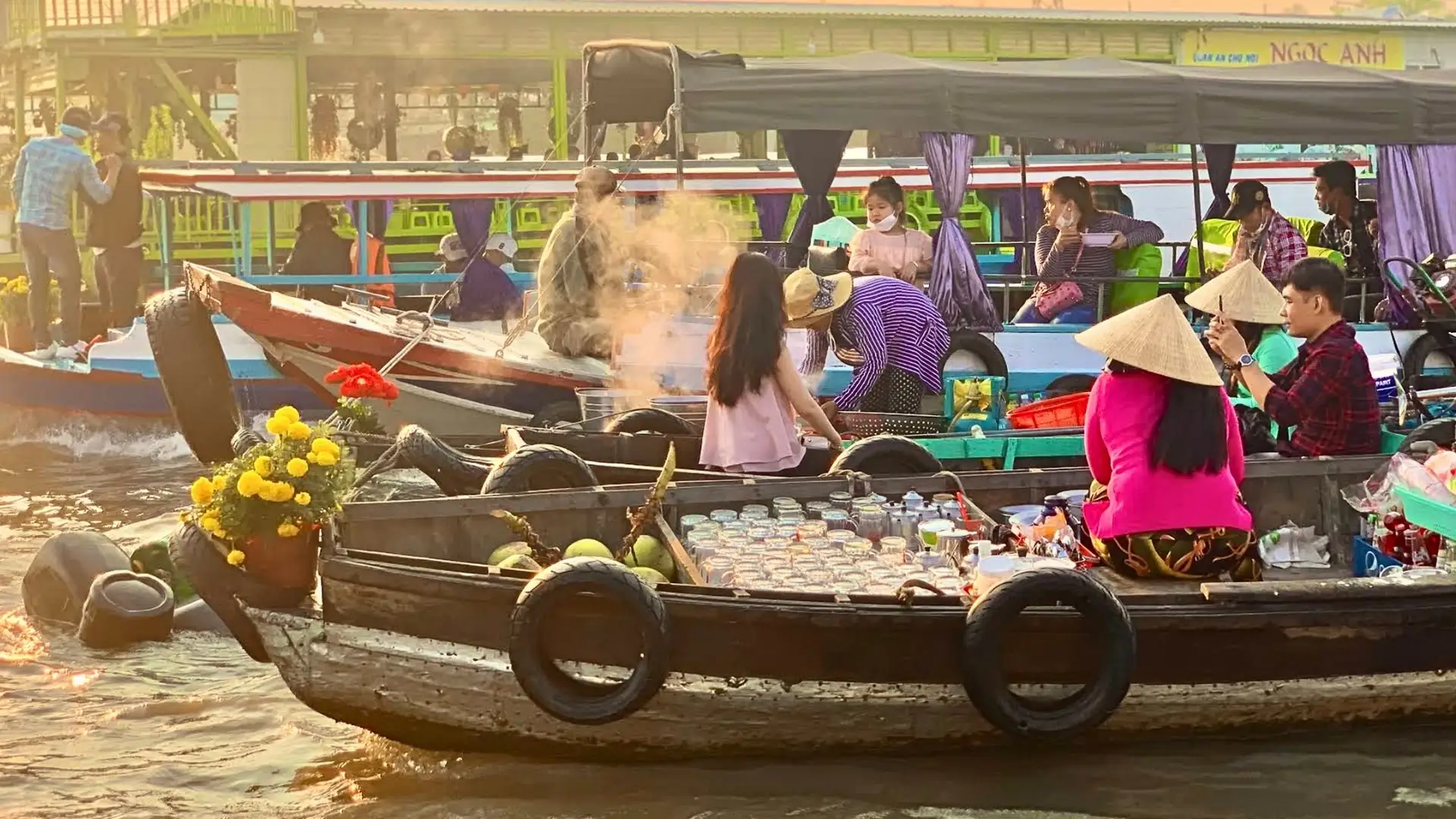 Mekong Smile Cai Be Floating Market sunlight reflecting on river and boats