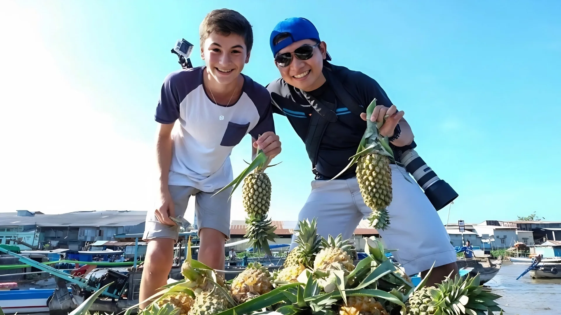 Mekong Smile Cai Be Floating Market tourists exploring the floating market by boat