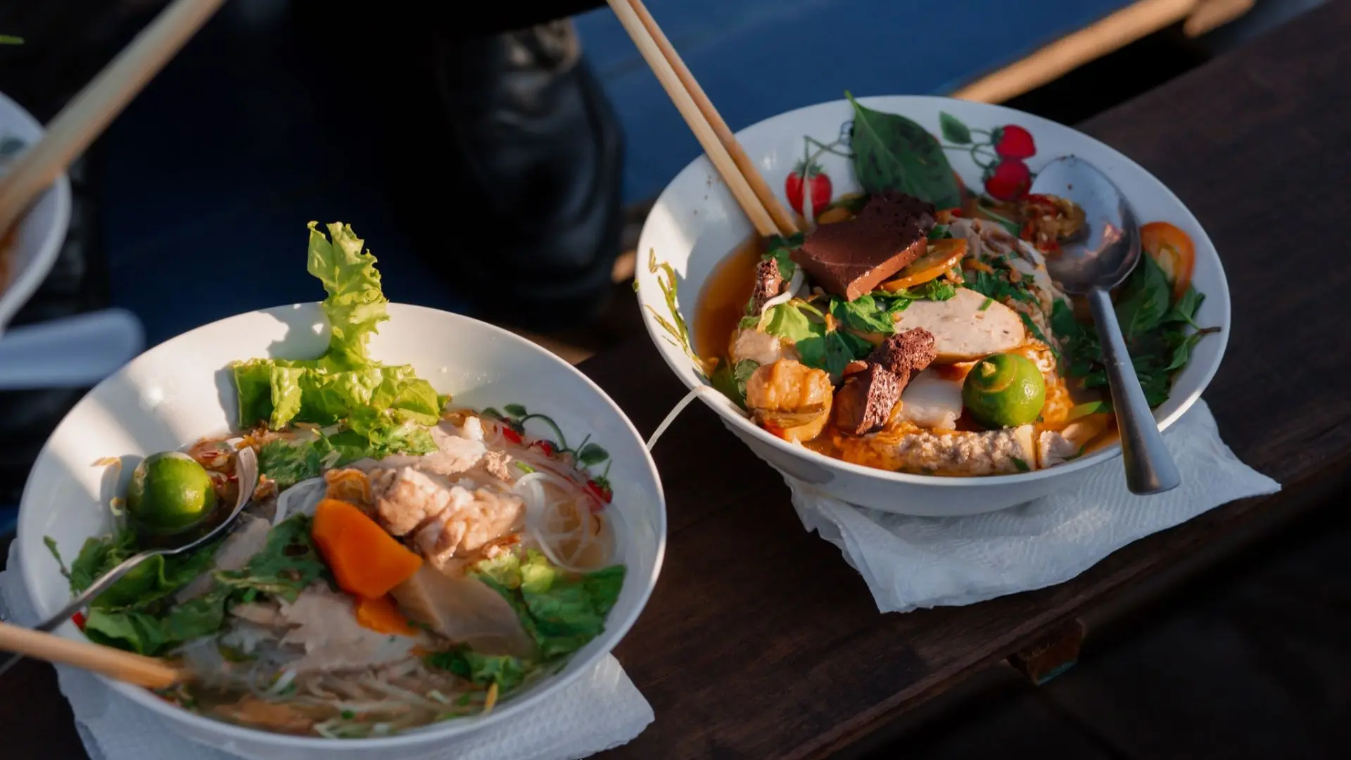 Vietnamese breakfast dishes served on boats at Cai Rang Floating Market, Mekong Delta
