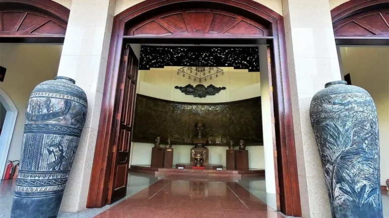 Main hall inside Can Tho Museum featuring displays about local history