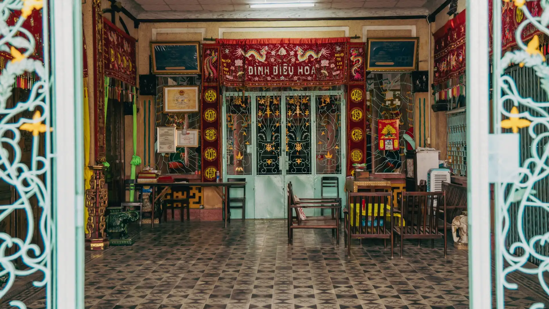 Traditional tiled interior and courtyard of Dieu Hoa Temple