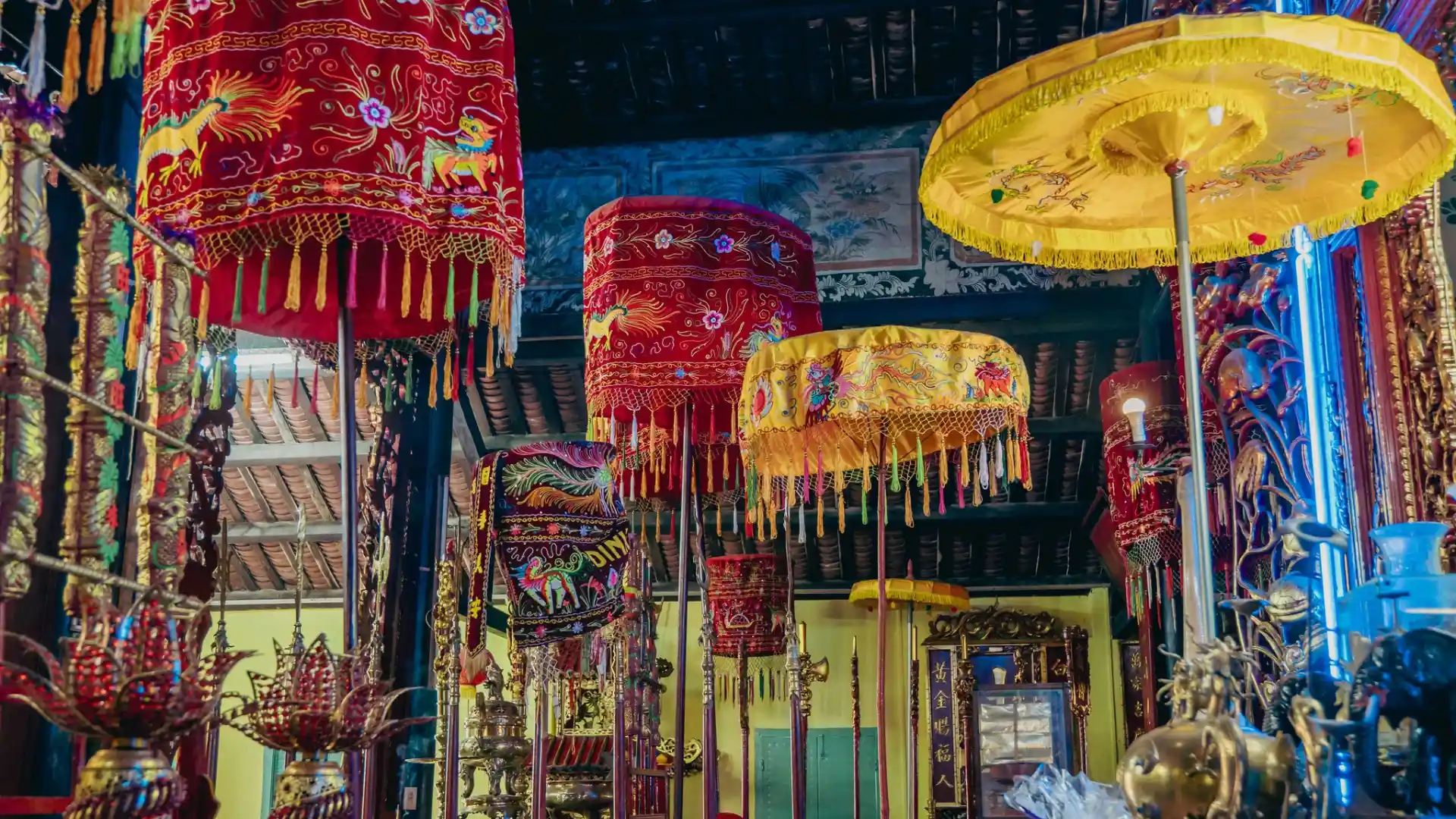 Traditional ritual umbrellas inside Dieu Hoa Temple