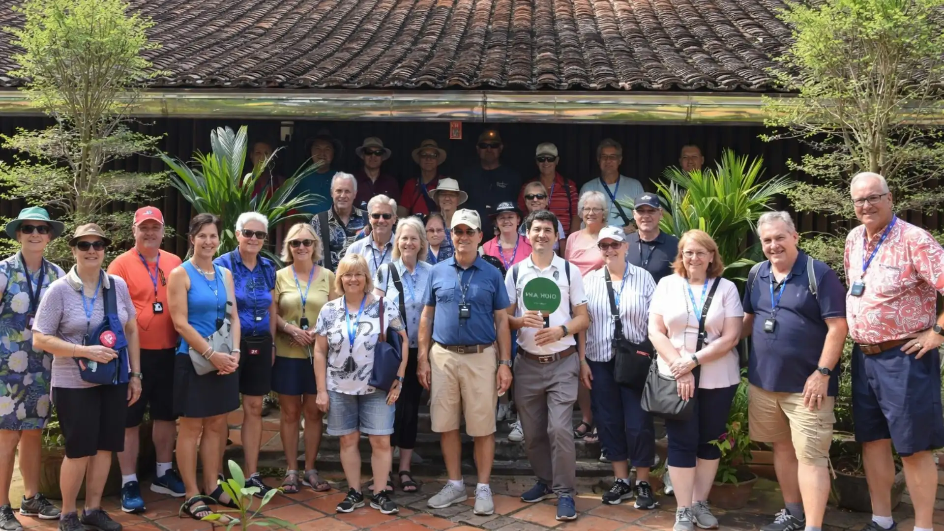 Mekong Smile Dong Hoa Hiep Ancient Village tour group exploring the heritage village with local guide