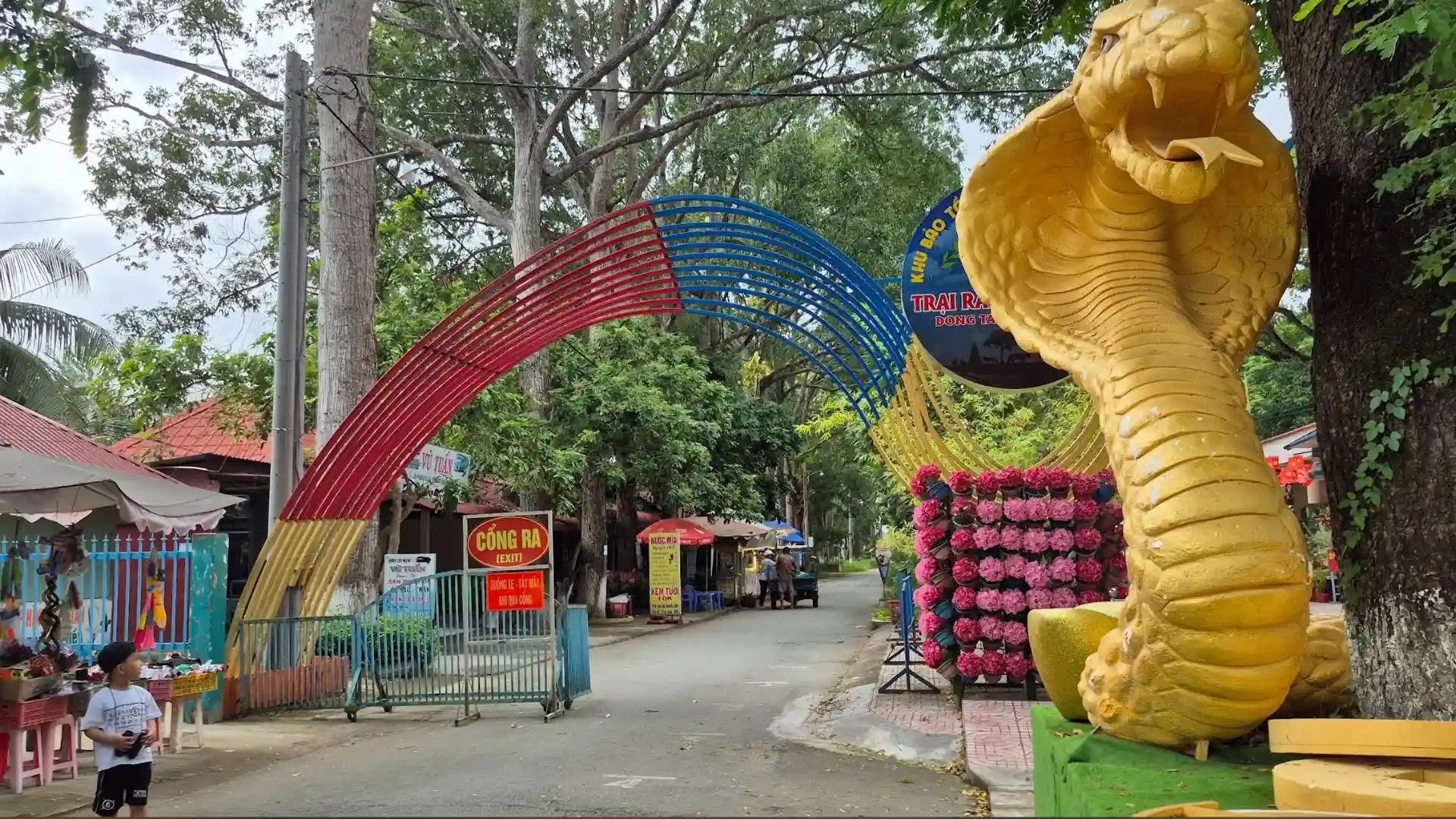 Giant cobra statue at the entrance of Dong Tam Snake Farm in Tien Giang, a famous wildlife attraction in the Mekong Delta