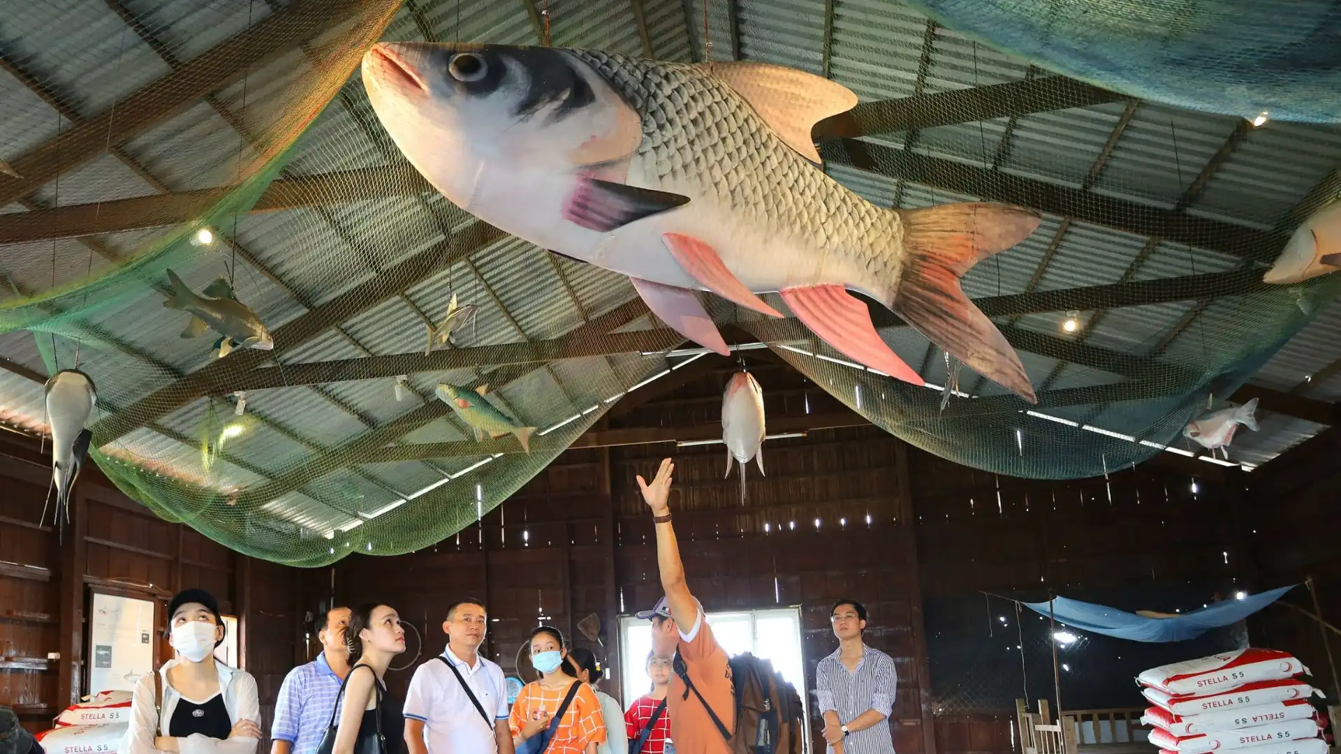 Indoor exhibition space at Mekong Smile floating fish farm