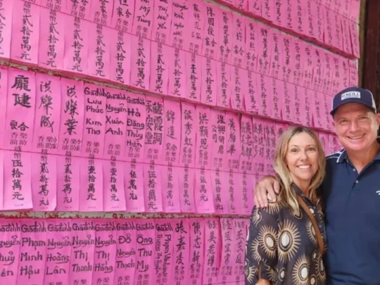 Visitors at the wishes wall of Ba Thien Hau Temple in Ho Chi Minh City