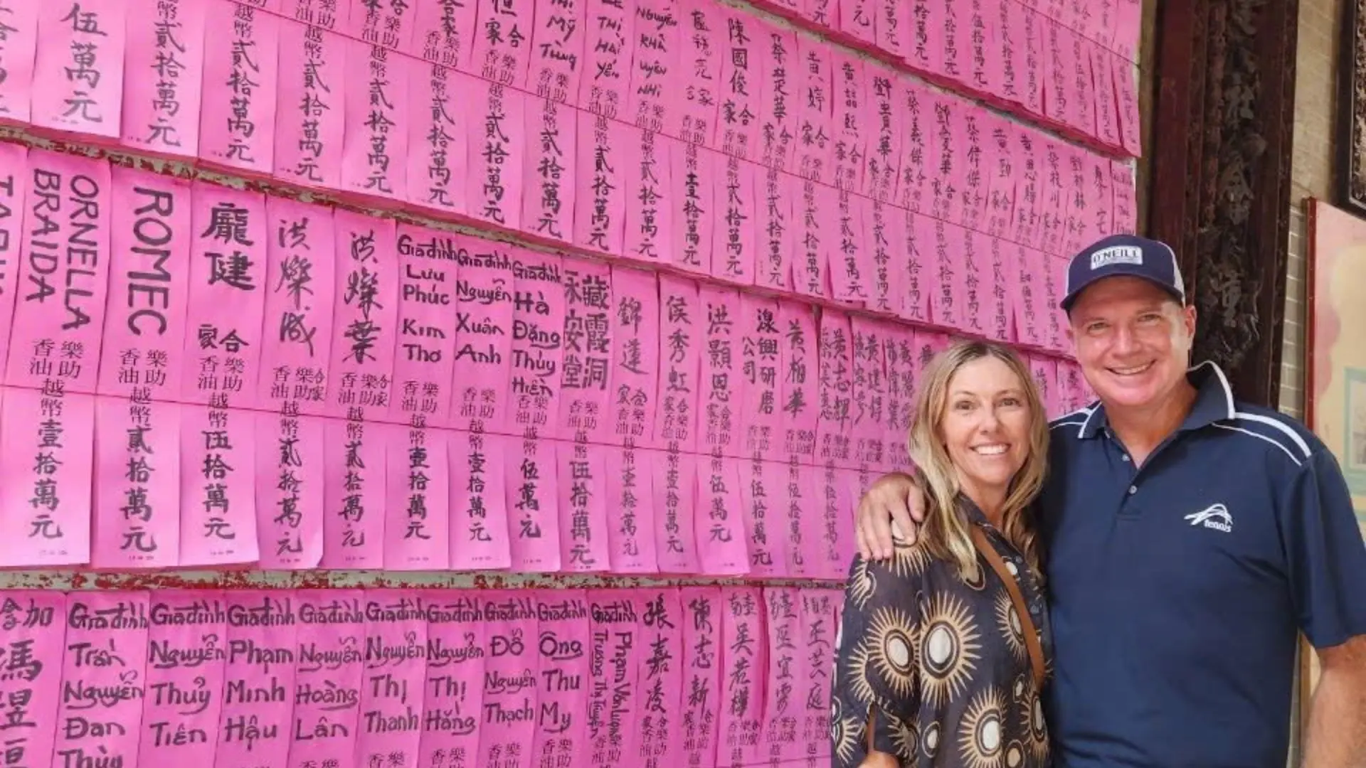 Visitors at the wishes wall of Ba Thien Hau Temple in Ho Chi Minh City
