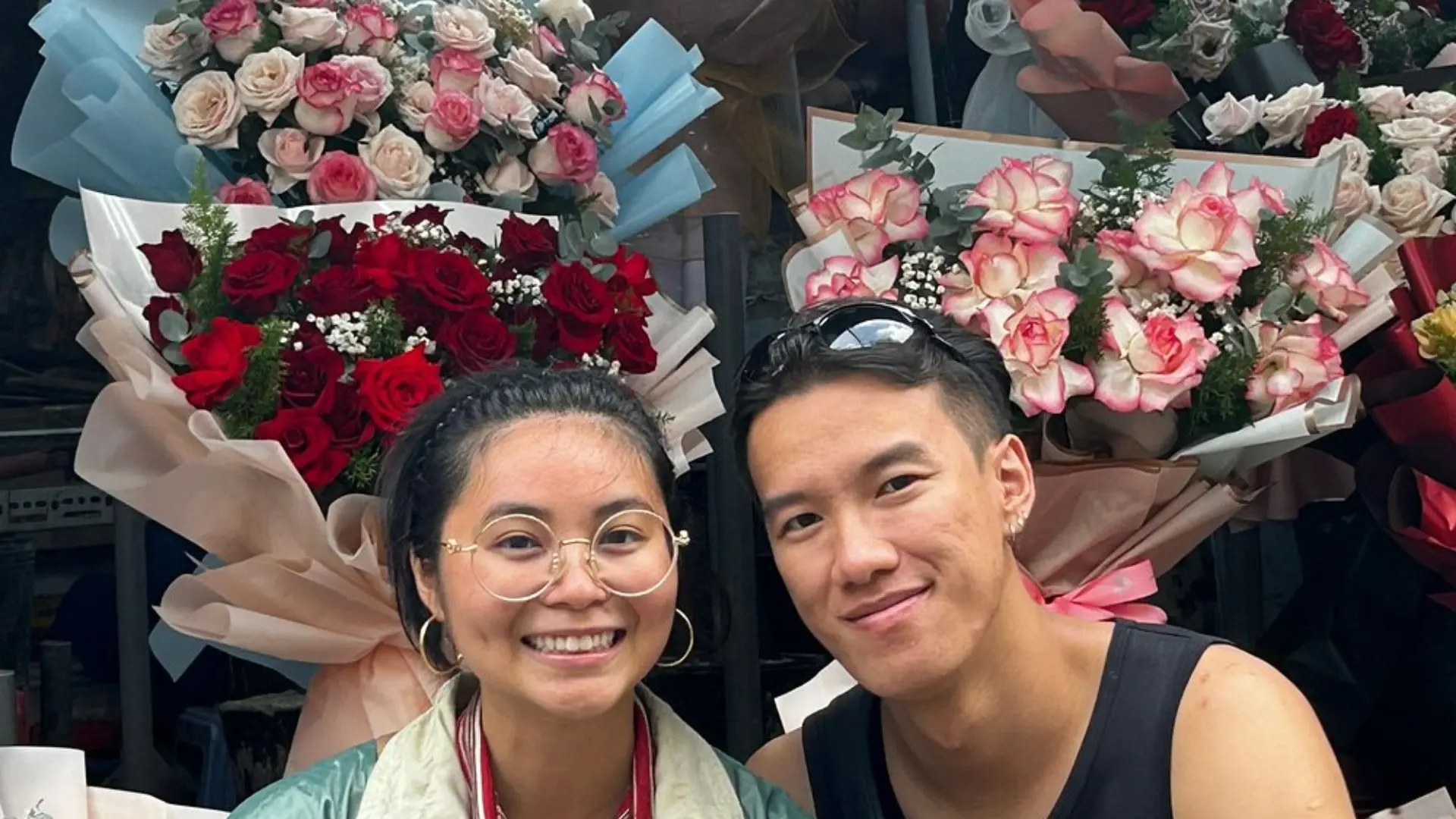 Tourists visiting a local ho thi ky flower market during Ho Chi Minh City motorbike tour