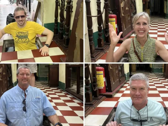 Visitors learning history at the Secret CIA Building during Ho Chi Minh motorbike tour