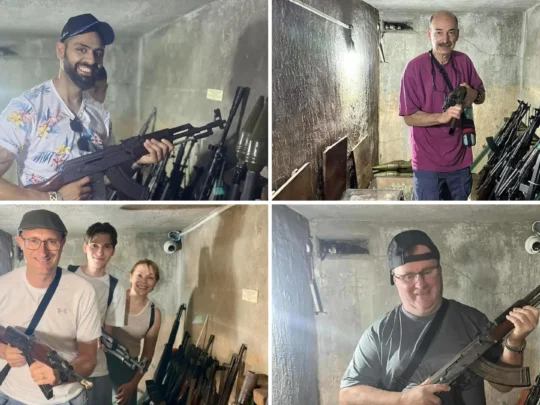 Tourists exploring the Secret CIA Building on Ho Chi Minh City motorbike tour