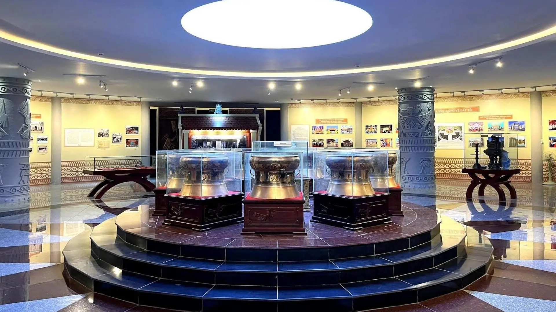 Circular exhibition hall with modern lighting and display panels at Hung King Temple Can Tho