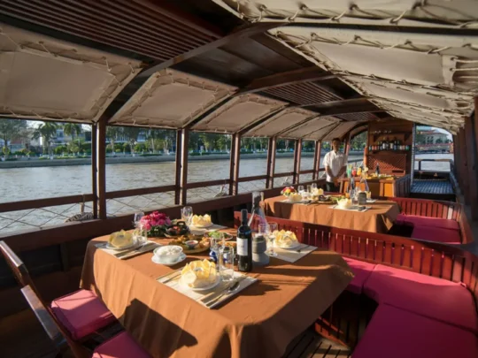 Elegant dining interior of Bassac Cruise during a Mekong Delta cruise in Can Tho, Vietnam