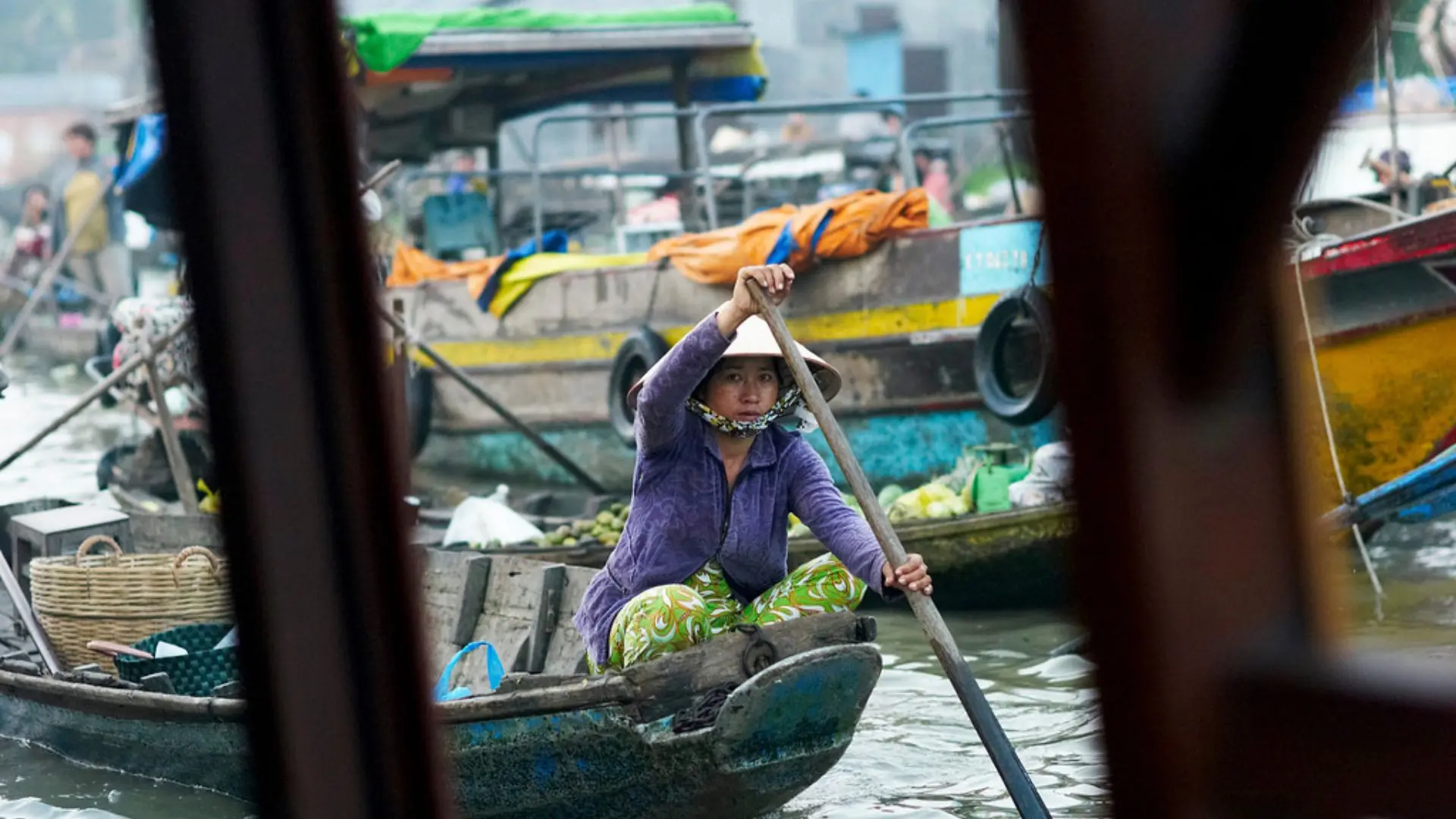 Daily life at Cai Rang Floating Market seen from a Mekong Delta cruise in Can Tho