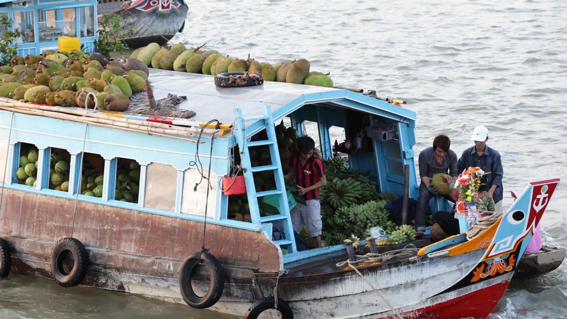 Fruit boats at Cai Rang Floating Market on the Mekong River in Can Tho