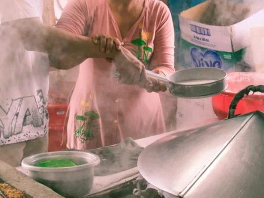 Traditional noodle making workshop during a luxury Mekong Delta cruise in Can Tho
