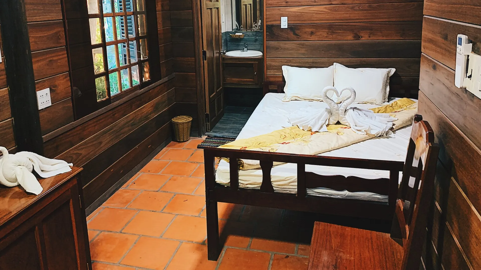 Mr Kiet Ancient House Cai Be: Vietnam’s 108 Pillar Heritage Home 159 Mekong Smile homestay traditional bedroom inside Mr Kiet Ancient House with wooden interior