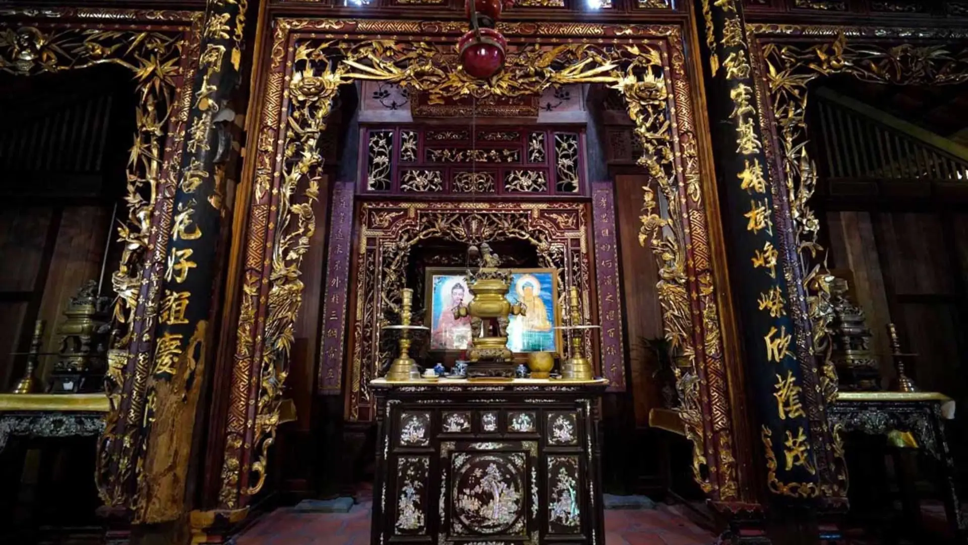 Mr Kiet Ancient House Cai Be: Vietnam’s 108 Pillar Heritage Home 157 Intricate carved wooden main ancestral altar within Mr Kiet Ancient House