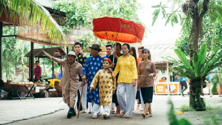 Traditional welcome ceremony with visitors at My Khanh Tourist Village