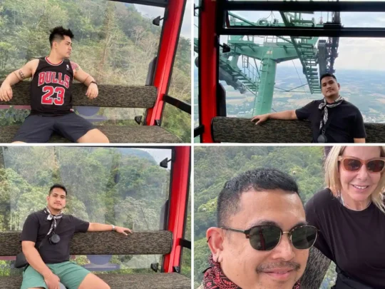 Tourists riding the cable car at Ba Den Mountain, Tay Ninh, Vietnam