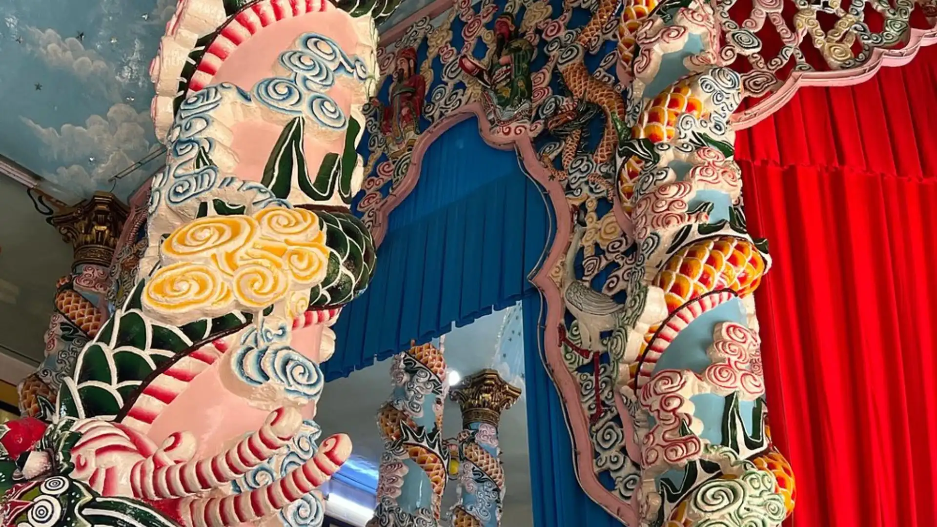 Close-up of dragon and Buddhist decorations at Ba Den Mountain temple, Tay Ninh