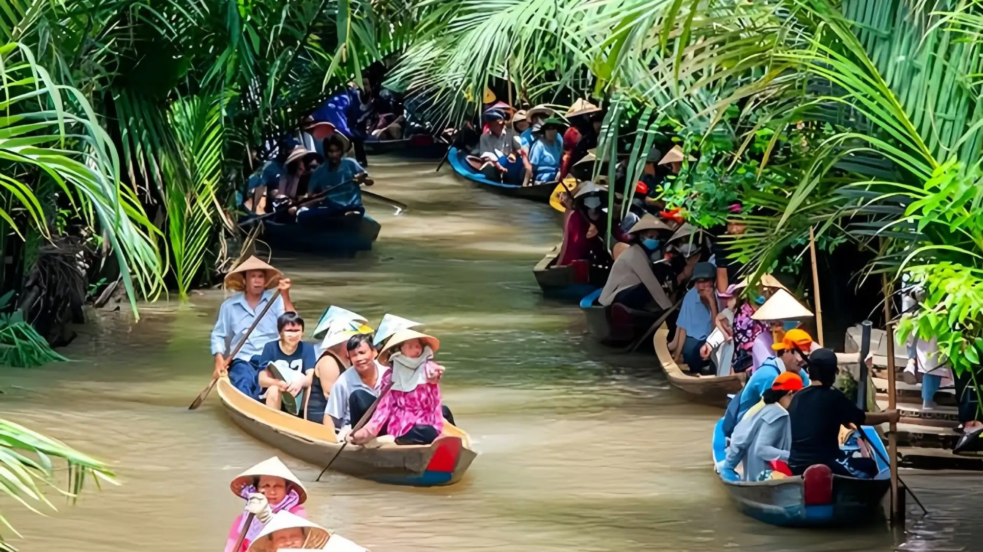 Phung Island (Phoenix Island): Discovering the Mysterious Coconut Religion 141 Sampan ride through coconut canals