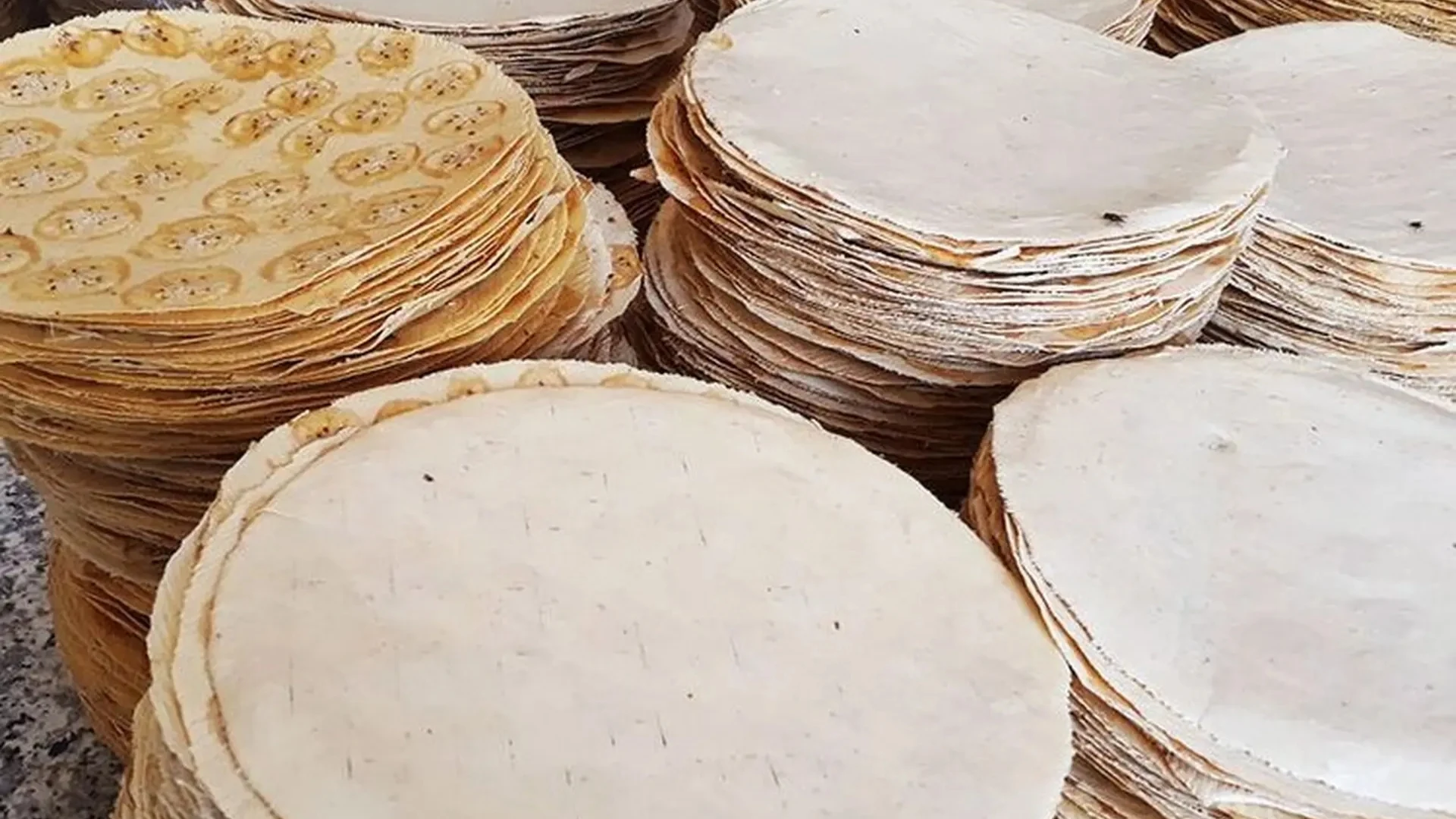 Son Doc Puff Rice Paper Village: Ben Tre’s Coconut Craft Heritage 162 Son Doc puff rice paper stacks showing texture and round shape