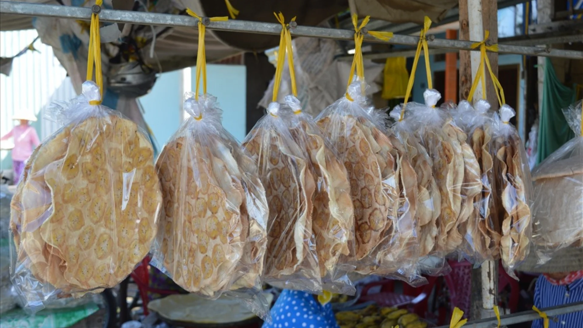 Son Doc Puff Rice Paper Village: Ben Tre’s Coconut Craft Heritage 165 Son Doc puff rice paper displayed for sale at the local village stall