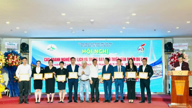 Mekong Smile team celebrating recognition for sustainable tourism achievements