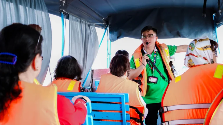 Tourists enjoying authentic Mekong Delta experience with Mekong Smile