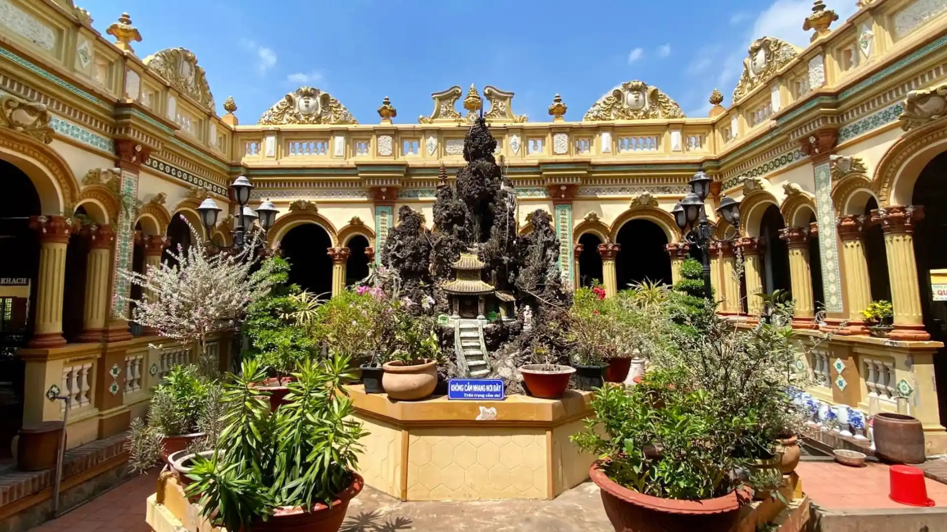 Inner courtyard garden of Vinh Trang Pagoda in My Tho, Tien Giang, Mekong Delta