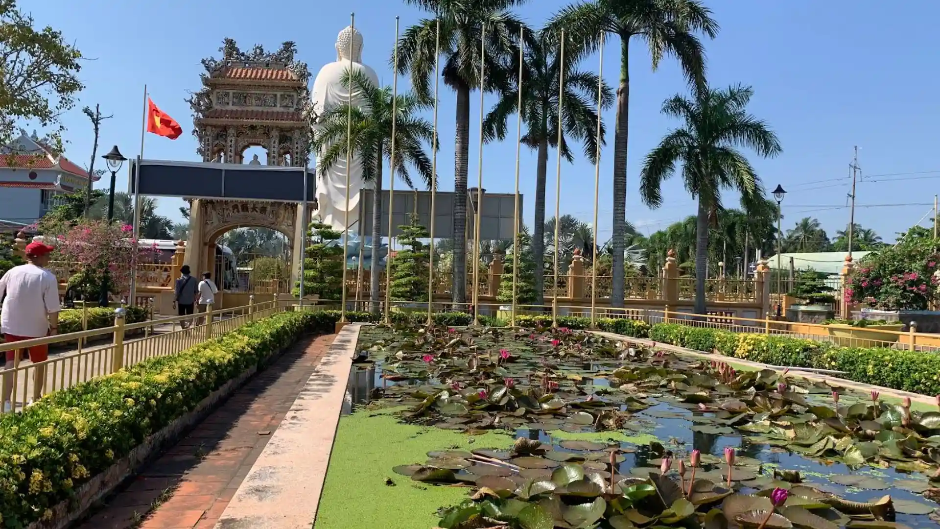 Lotus pond and garden landscape at Vinh Trang Pagoda in My Tho, Tien Giang