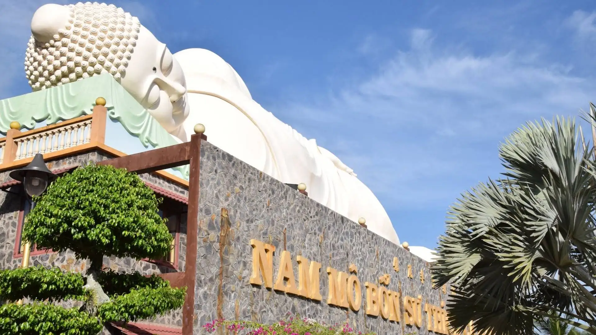 Reclining Buddha statue area at Vinh Trang Pagoda in My Tho, Tien Giang
