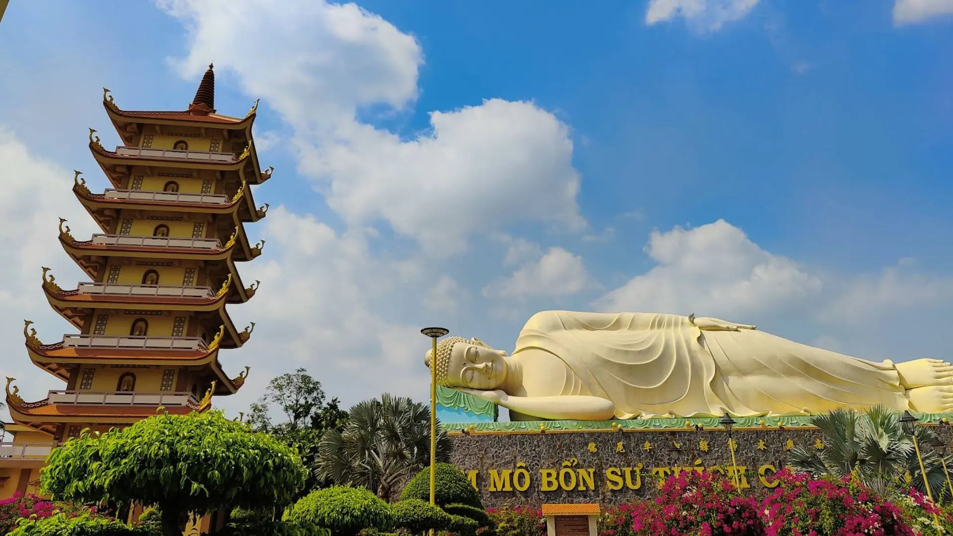 Large reclining Buddha statue at Vinh Trang Pagoda in Tien Giang, Vietnam