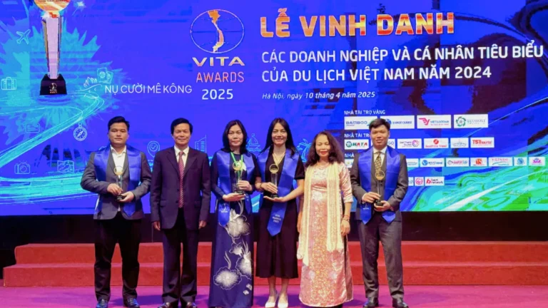 Mekong Smile receiving VITA AWARDS 2025 trophy
