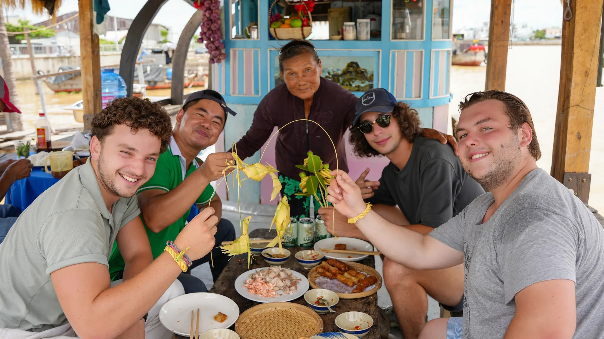 Tourist showing respect by bowing slightly to a Vietnamese elder at a temple