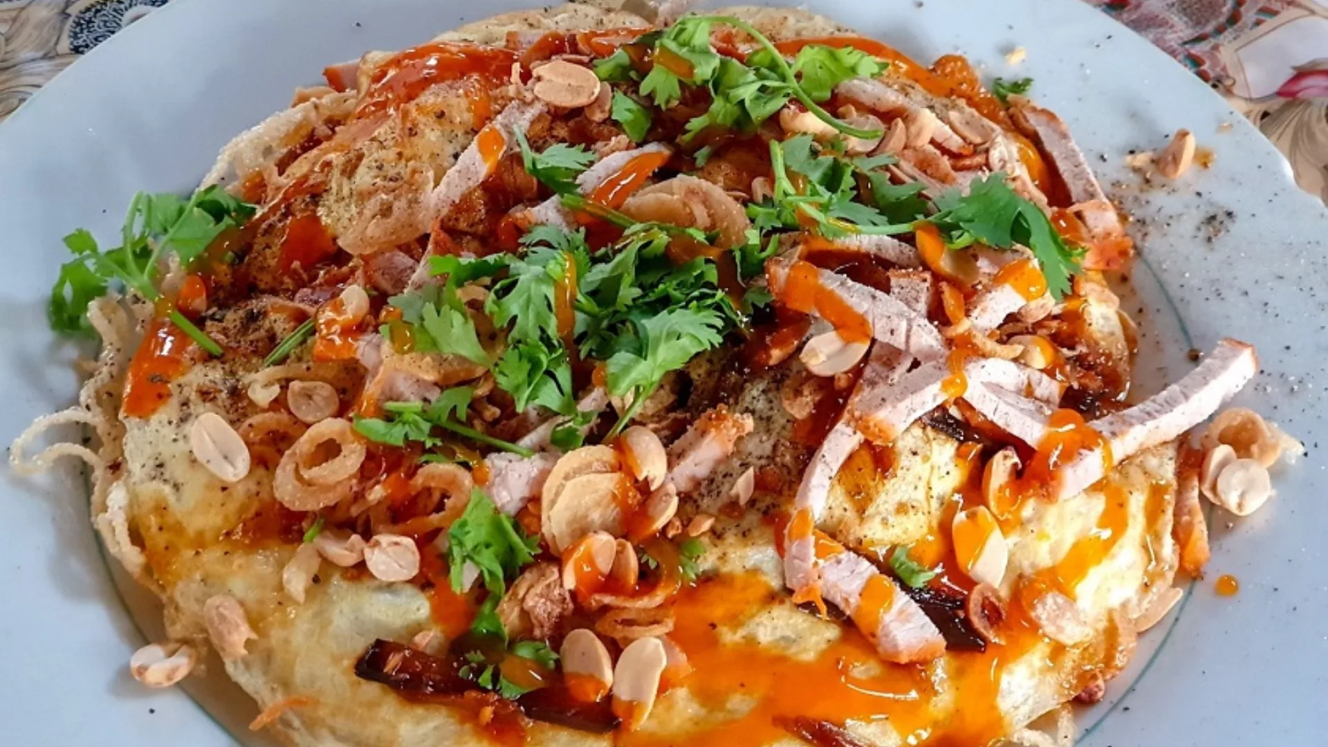 Tasting the famous rice noodle pizza at Sau Hoai Rice Noodle Factory Can Tho – a unique Mekong delicacy