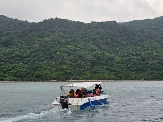 Small boat transfer to Ba Island for Love Peak Hike Con Dao
