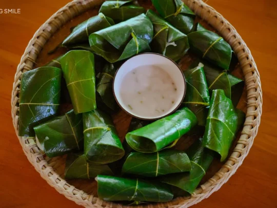 A photo of a traditional Vietnamese cake or pancake, a local culinary specialty served on Son Islet.