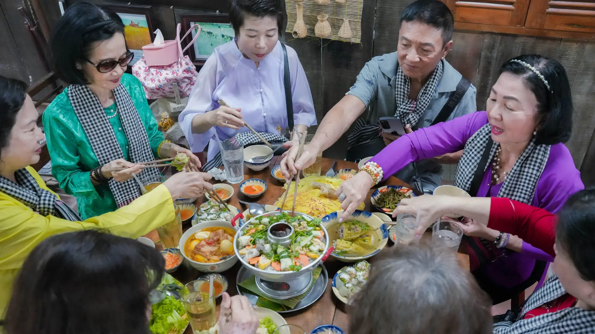 Mekong Smile Honored at VITA AWARDS 2025 for Death Anniversary Feast Tour 10 Guests wearing traditional ba ba shirts and enjoying folk games on Con Son Islet